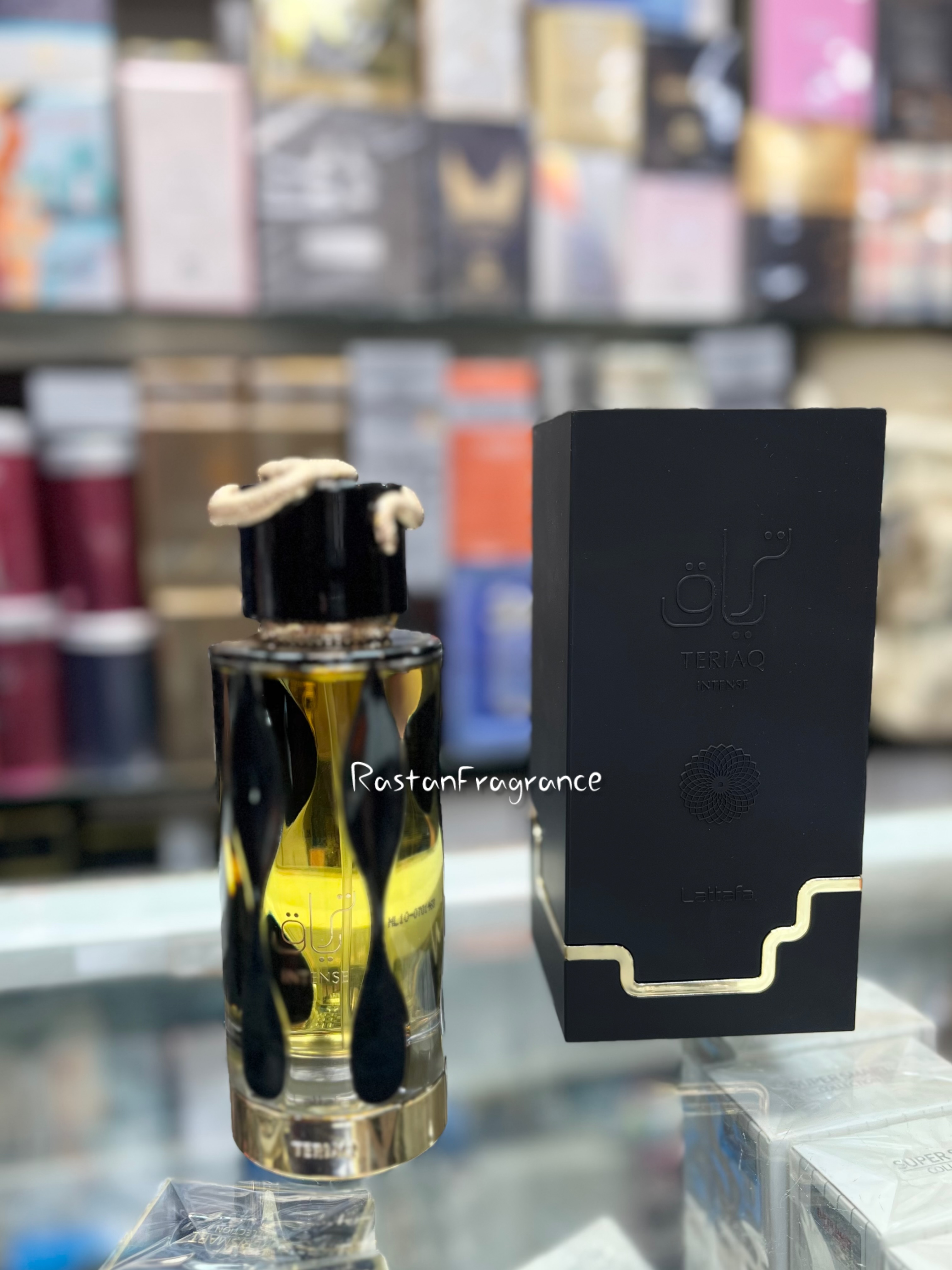 عطر ادکلن مردانه لطافه تریاق اینتنس